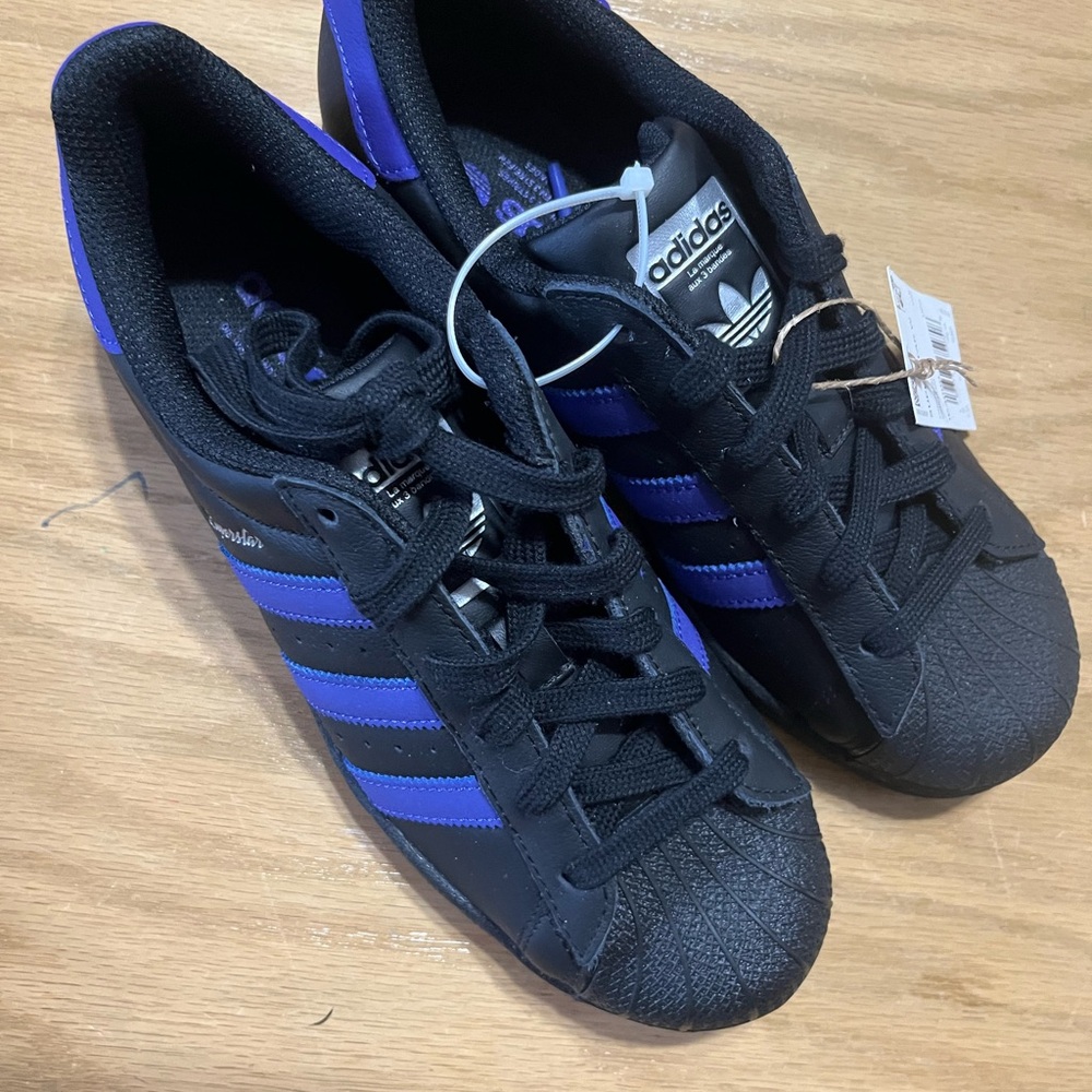 Adidas women’s Black and Purple Sneakers